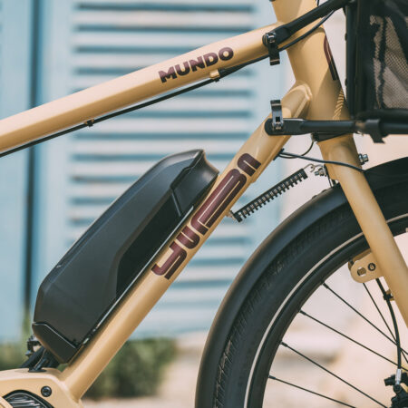 Yuba_Bikes_Mundo_EP8_Sand_Closeup_Battery_Shimano_Logo_Deflopilator Yuba Bikes Mundo EP8 Sand Closeup Battery Shimano Logo Deflopilator